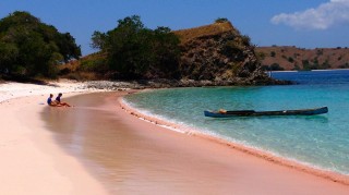 Couple at the beach - Travel with a cause